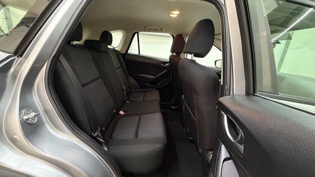 2015 Silver Mazda CX-5 Sport (JM3KE2BE8F0) with an SKYACTIV-G 2L I-4 gasoline direct injection engine, located at 1806 Veterans Memorial Hwy SW, Austell, GA, 30168, (770) 944-9558, 33.817959, -84.606987 - Photo#17