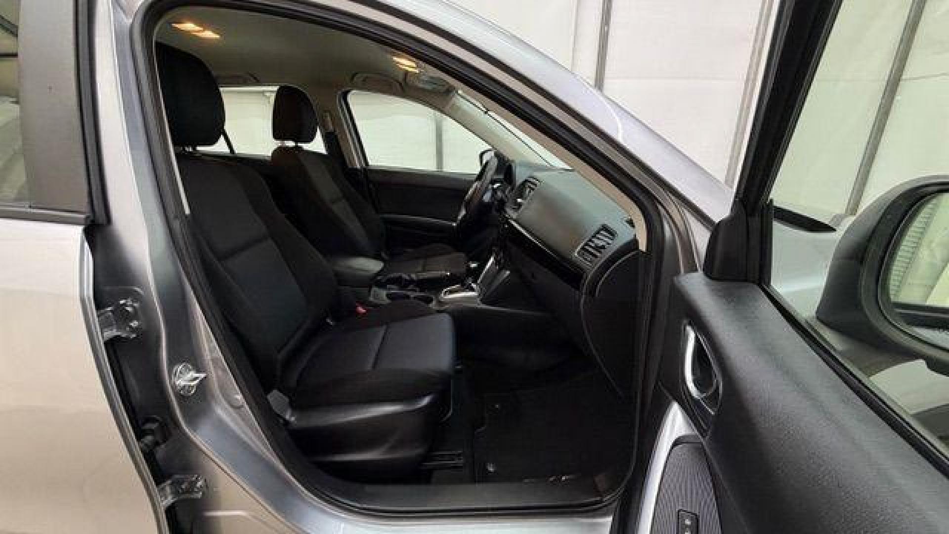 2015 Silver Mazda CX-5 Sport (JM3KE2BE8F0) with an SKYACTIV-G 2L I-4 gasoline direct injection engine, located at 1806 Veterans Memorial Hwy SW, Austell, GA, 30168, (770) 944-9558, 33.817959, -84.606987 - Photo#18