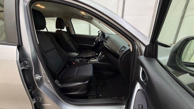2015 Silver Mazda CX-5 Sport (JM3KE2BE8F0) with an SKYACTIV-G 2L I-4 gasoline direct injection engine, located at 1806 Veterans Memorial Hwy SW, Austell, GA, 30168, (770) 944-9558, 33.817959, -84.606987 - Photo#18