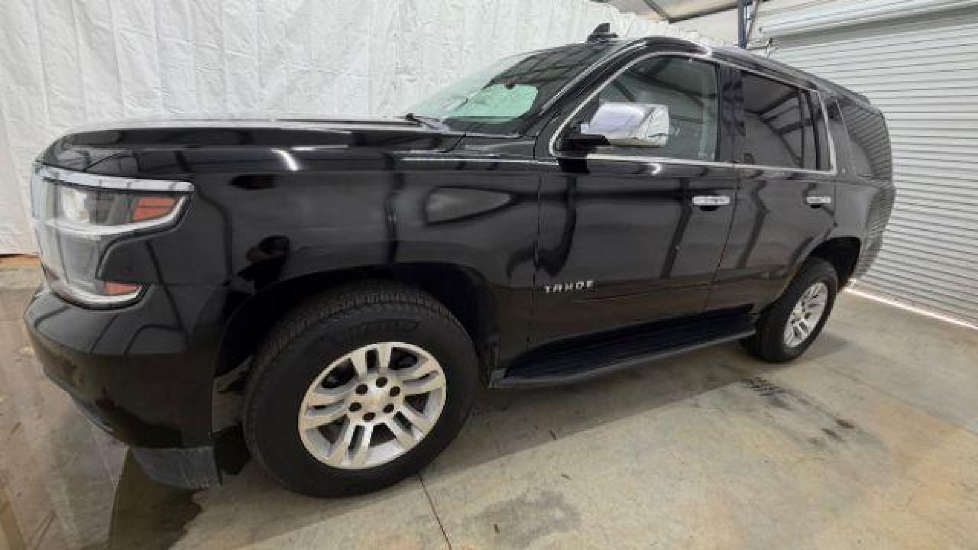 2017 BLACK Chevrolet Tahoe LT (1GNSKBKC1HR) with an EcoTec3 5.3L V-8 gasoline direct injection engine, located at 1806 Veterans Memorial Hwy SW, Austell, GA, 30168, (770) 944-9558, 33.817959, -84.606987 - Photo#1