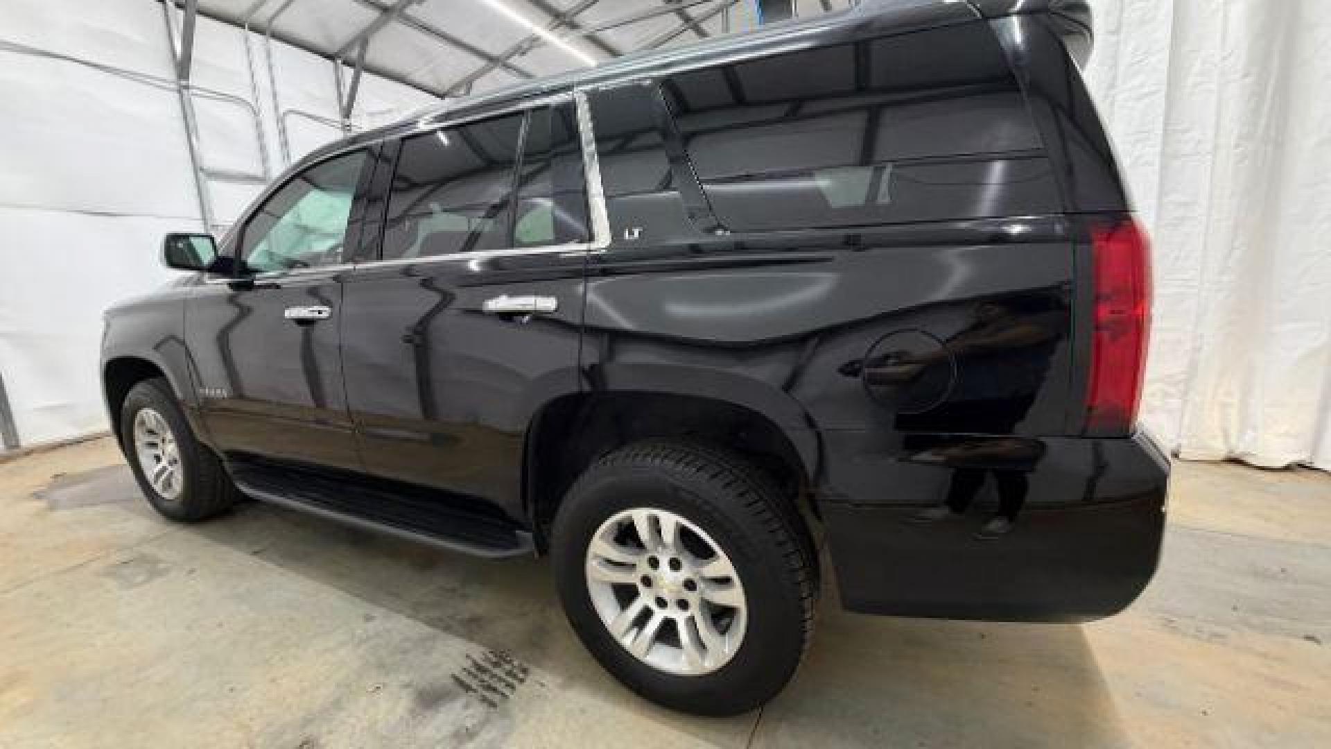 2017 BLACK Chevrolet Tahoe LT (1GNSKBKC1HR) with an EcoTec3 5.3L V-8 gasoline direct injection engine, located at 1806 Veterans Memorial Hwy SW, Austell, GA, 30168, (770) 944-9558, 33.817959, -84.606987 - Photo#2