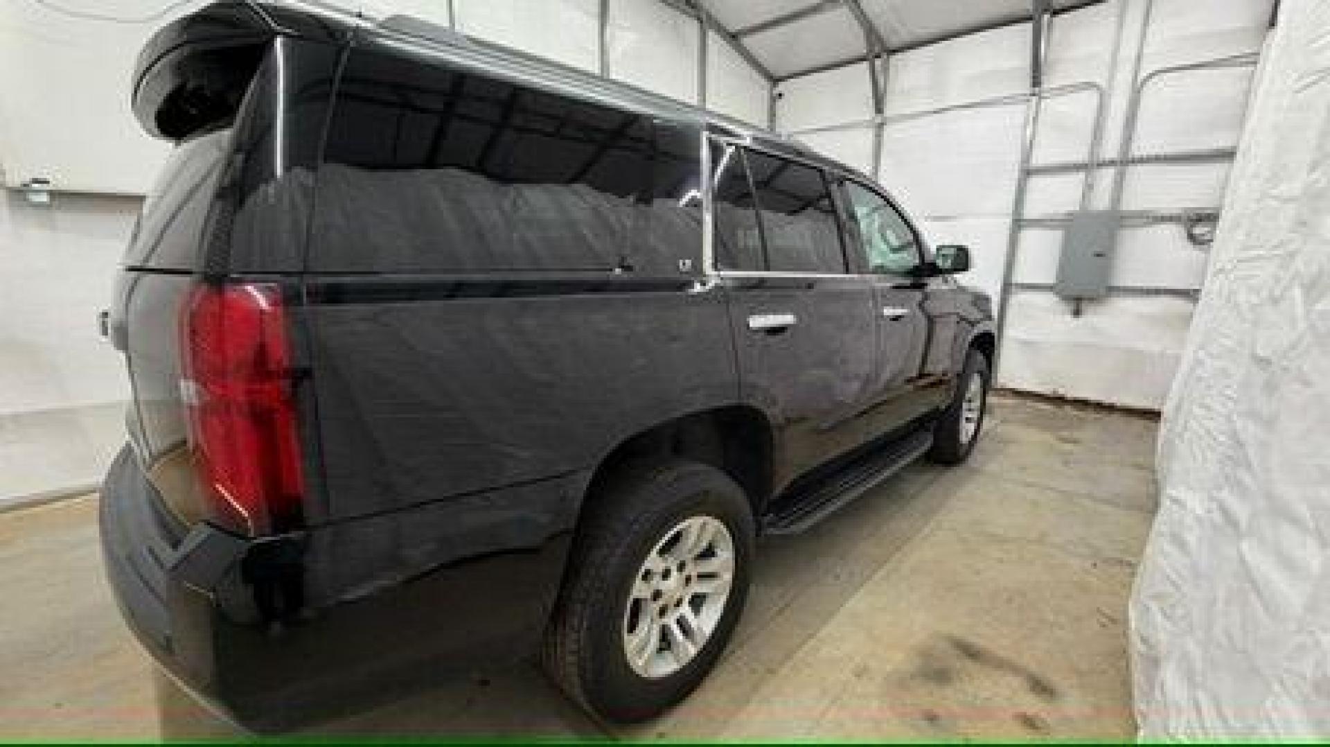 2017 BLACK Chevrolet Tahoe LT (1GNSKBKC1HR) with an EcoTec3 5.3L V-8 gasoline direct injection engine, located at 1806 Veterans Memorial Hwy SW, Austell, GA, 30168, (770) 944-9558, 33.817959, -84.606987 - Photo#6