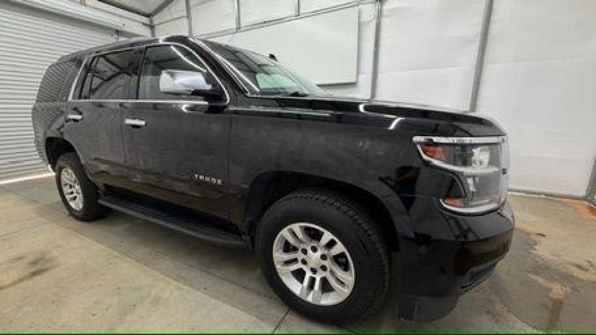 2017 BLACK Chevrolet Tahoe LT (1GNSKBKC1HR) with an EcoTec3 5.3L V-8 gasoline direct injection engine, located at 1806 Veterans Memorial Hwy SW, Austell, GA, 30168, (770) 944-9558, 33.817959, -84.606987 - Photo#7