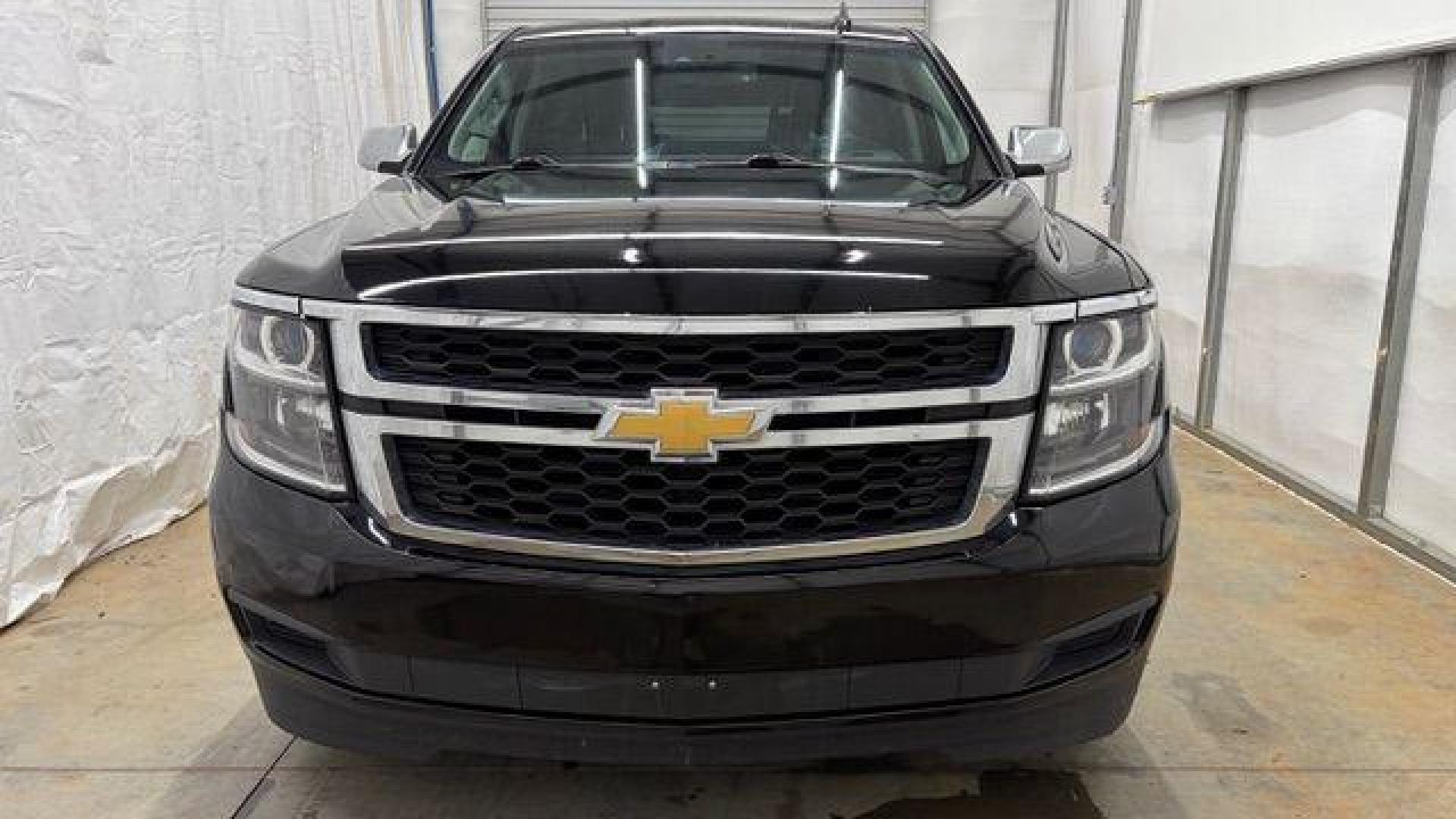 2017 BLACK Chevrolet Tahoe LT (1GNSKBKC1HR) with an EcoTec3 5.3L V-8 gasoline direct injection engine, located at 1806 Veterans Memorial Hwy SW, Austell, GA, 30168, (770) 944-9558, 33.817959, -84.606987 - Photo#9