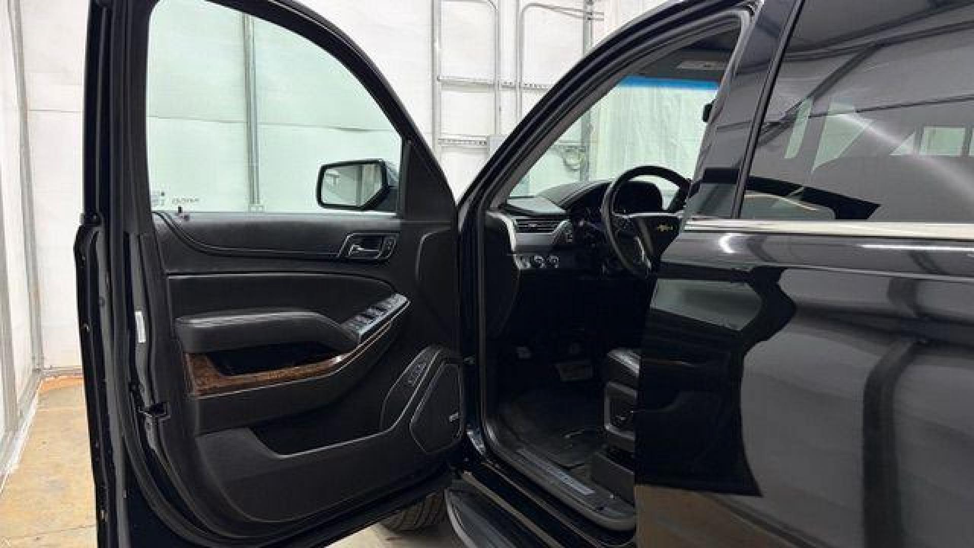 2017 BLACK Chevrolet Tahoe LT (1GNSKBKC1HR) with an EcoTec3 5.3L V-8 gasoline direct injection engine, located at 1806 Veterans Memorial Hwy SW, Austell, GA, 30168, (770) 944-9558, 33.817959, -84.606987 - Photo#10