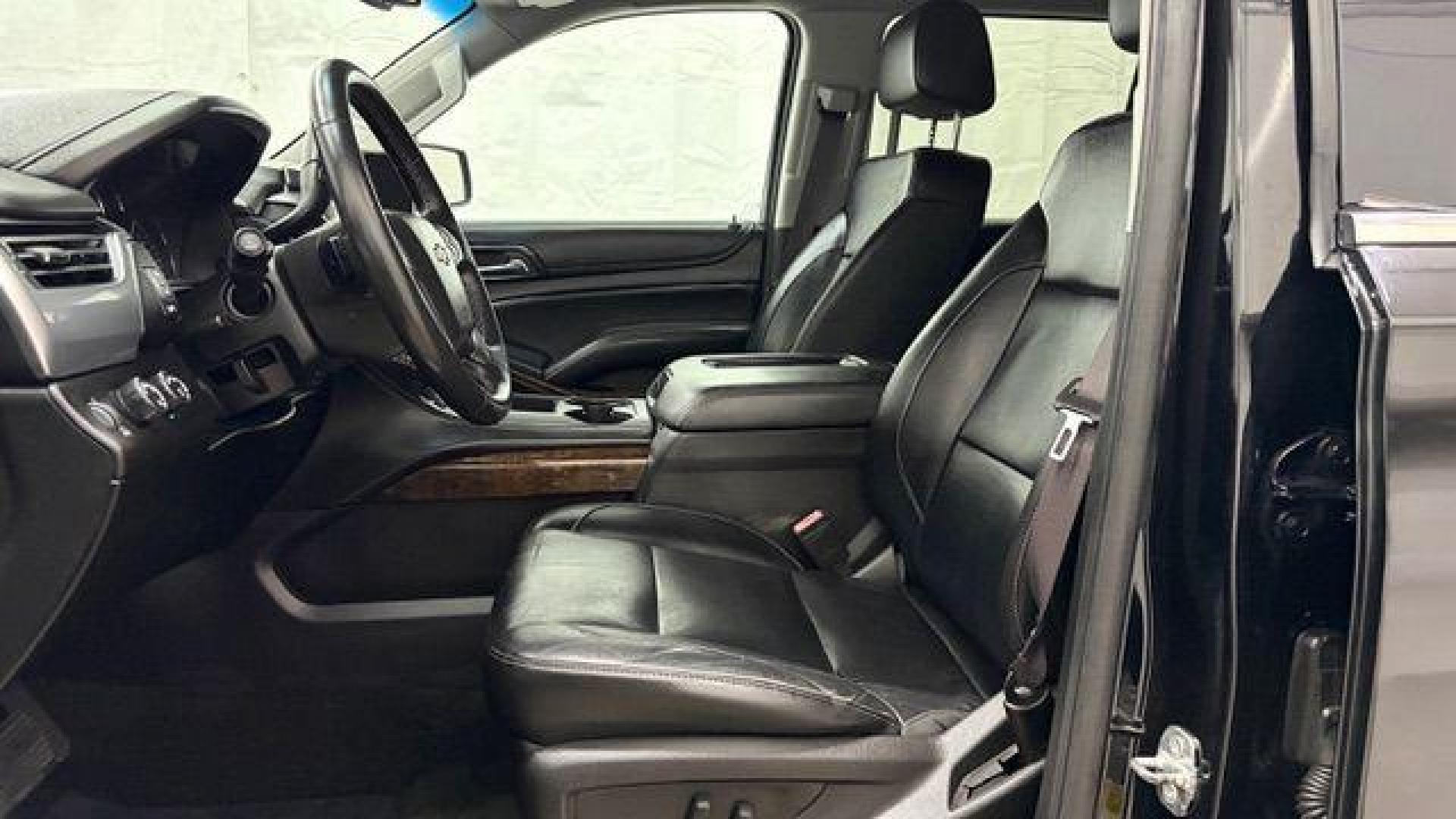 2017 BLACK Chevrolet Tahoe LT (1GNSKBKC1HR) with an EcoTec3 5.3L V-8 gasoline direct injection engine, located at 1806 Veterans Memorial Hwy SW, Austell, GA, 30168, (770) 944-9558, 33.817959, -84.606987 - Photo#11