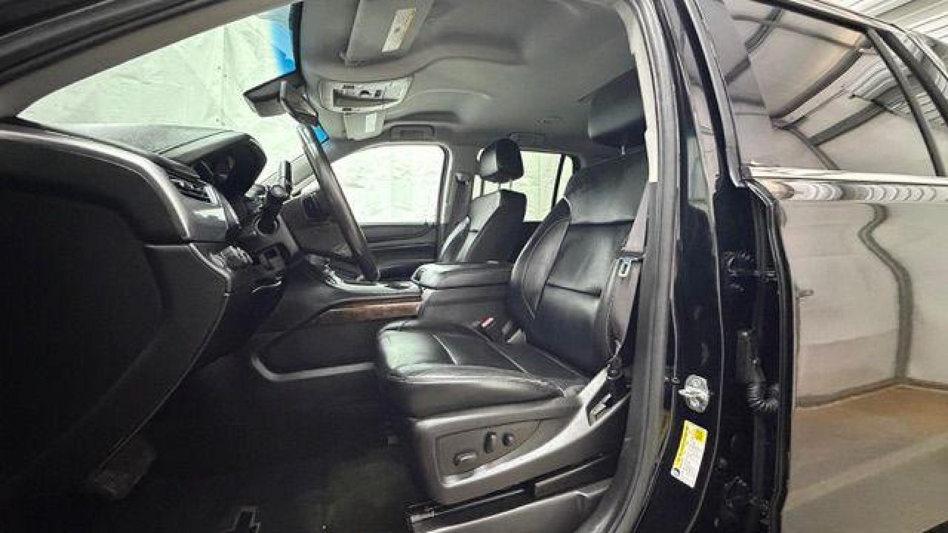 2017 BLACK Chevrolet Tahoe LT (1GNSKBKC1HR) with an EcoTec3 5.3L V-8 gasoline direct injection engine, located at 1806 Veterans Memorial Hwy SW, Austell, GA, 30168, (770) 944-9558, 33.817959, -84.606987 - Photo#12