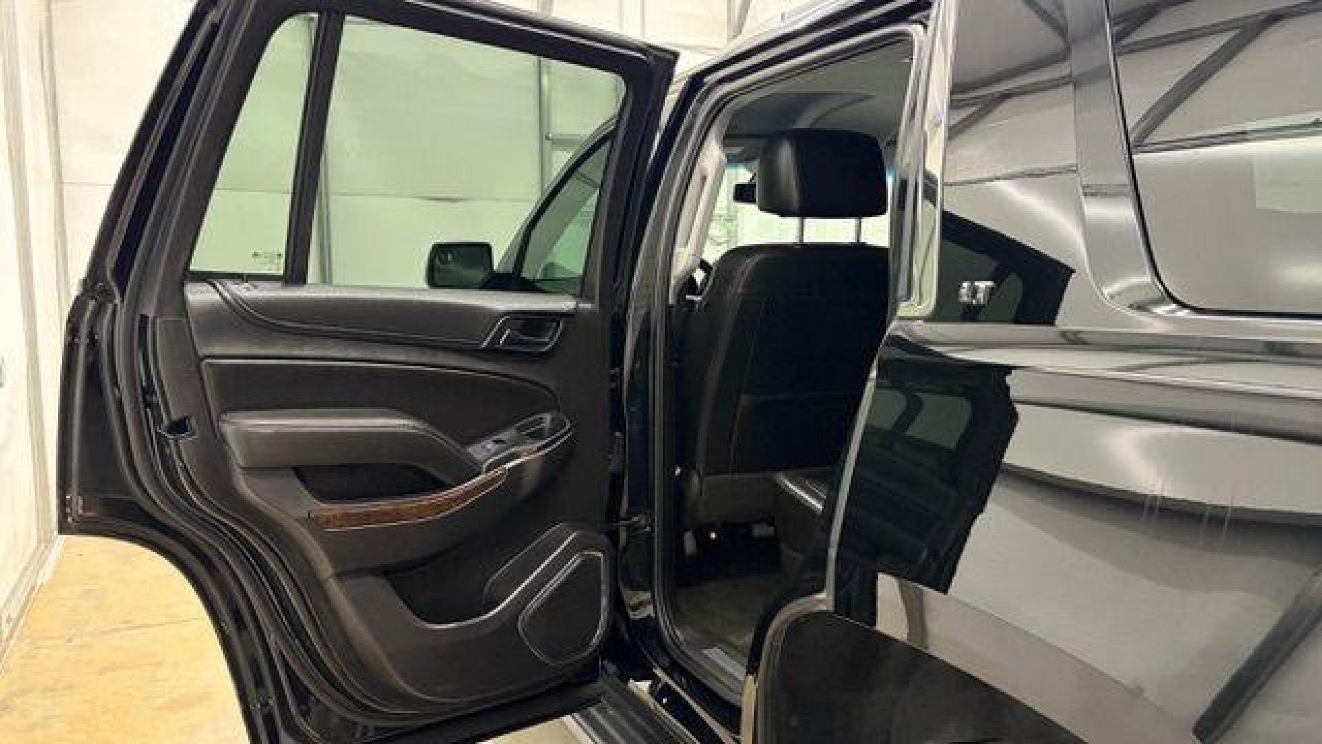 2017 BLACK Chevrolet Tahoe LT (1GNSKBKC1HR) with an EcoTec3 5.3L V-8 gasoline direct injection engine, located at 1806 Veterans Memorial Hwy SW, Austell, GA, 30168, (770) 944-9558, 33.817959, -84.606987 - Photo#13