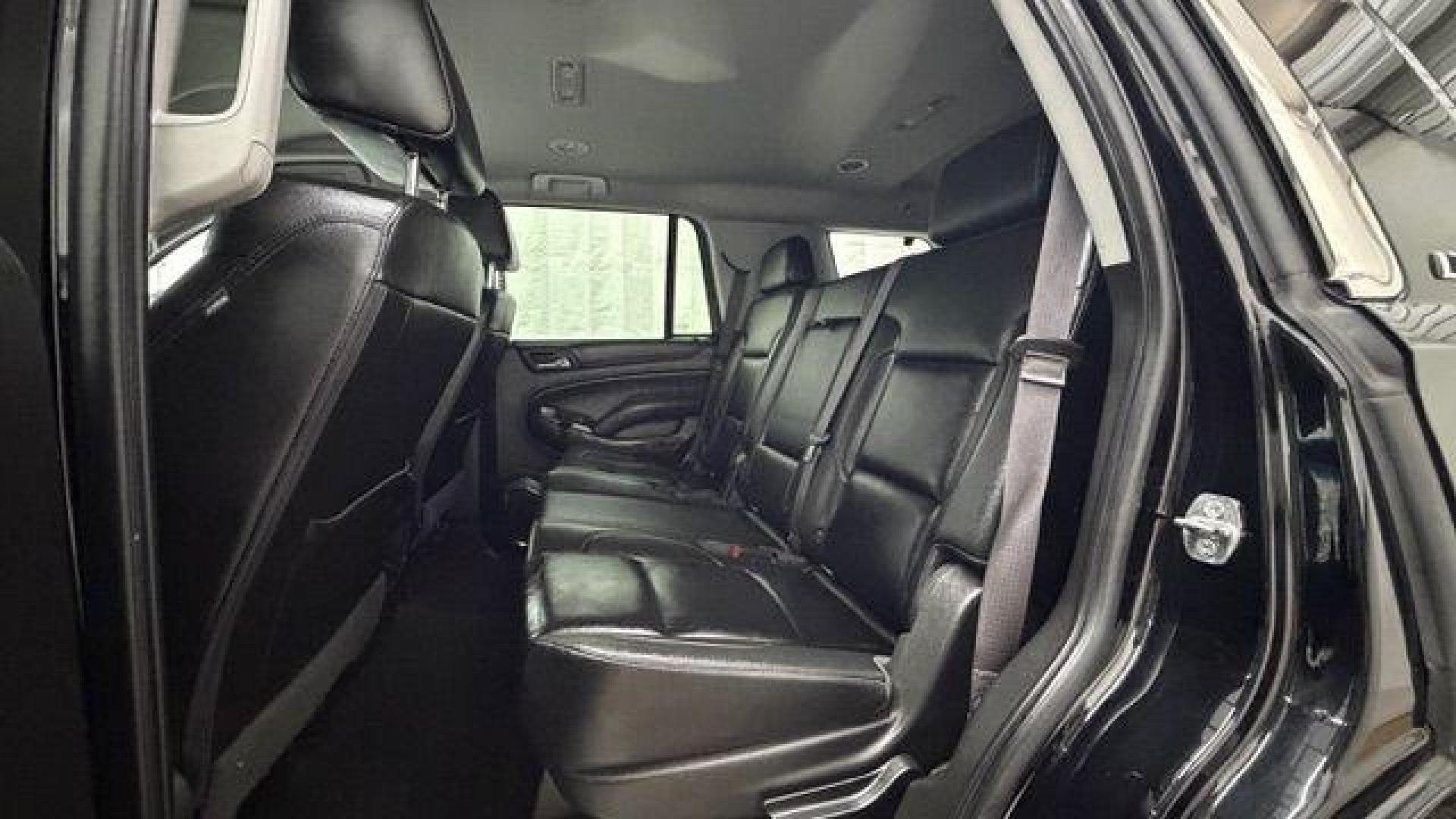 2017 BLACK Chevrolet Tahoe LT (1GNSKBKC1HR) with an EcoTec3 5.3L V-8 gasoline direct injection engine, located at 1806 Veterans Memorial Hwy SW, Austell, GA, 30168, (770) 944-9558, 33.817959, -84.606987 - Photo#14