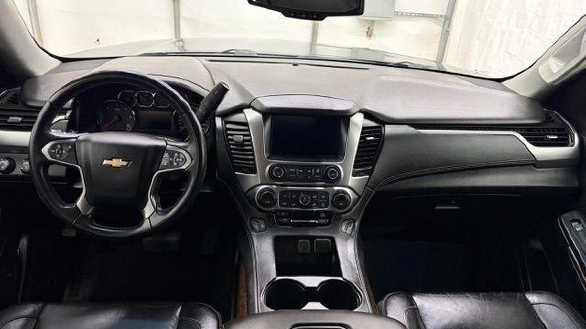 2017 BLACK Chevrolet Tahoe LT (1GNSKBKC1HR) with an EcoTec3 5.3L V-8 gasoline direct injection engine, located at 1806 Veterans Memorial Hwy SW, Austell, GA, 30168, (770) 944-9558, 33.817959, -84.606987 - Photo#16