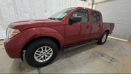 2016 Red Nissan Frontier SV (1N6AD0ER9GN) with an VQ 4L V-6 DOHC engine, located at 1806 Veterans Memorial Hwy SW, Austell, GA, 30168, (770) 944-9558, 33.817959, -84.606987 - Photo#1
