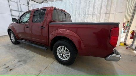2016 Red Nissan Frontier SV (1N6AD0ER9GN) with an VQ 4L V-6 DOHC engine, located at 1806 Veterans Memorial Hwy SW, Austell, GA, 30168, (770) 944-9558, 33.817959, -84.606987 - Photo#2