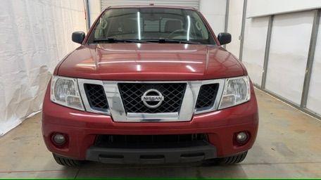 2016 Red Nissan Frontier SV (1N6AD0ER9GN) with an VQ 4L V-6 DOHC engine, located at 1806 Veterans Memorial Hwy SW, Austell, GA, 30168, (770) 944-9558, 33.817959, -84.606987 - Photo#4