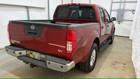 2016 Red Nissan Frontier SV (1N6AD0ER9GN) with an VQ 4L V-6 DOHC engine, located at 1806 Veterans Memorial Hwy SW, Austell, GA, 30168, (770) 944-9558, 33.817959, -84.606987 - Photo#7