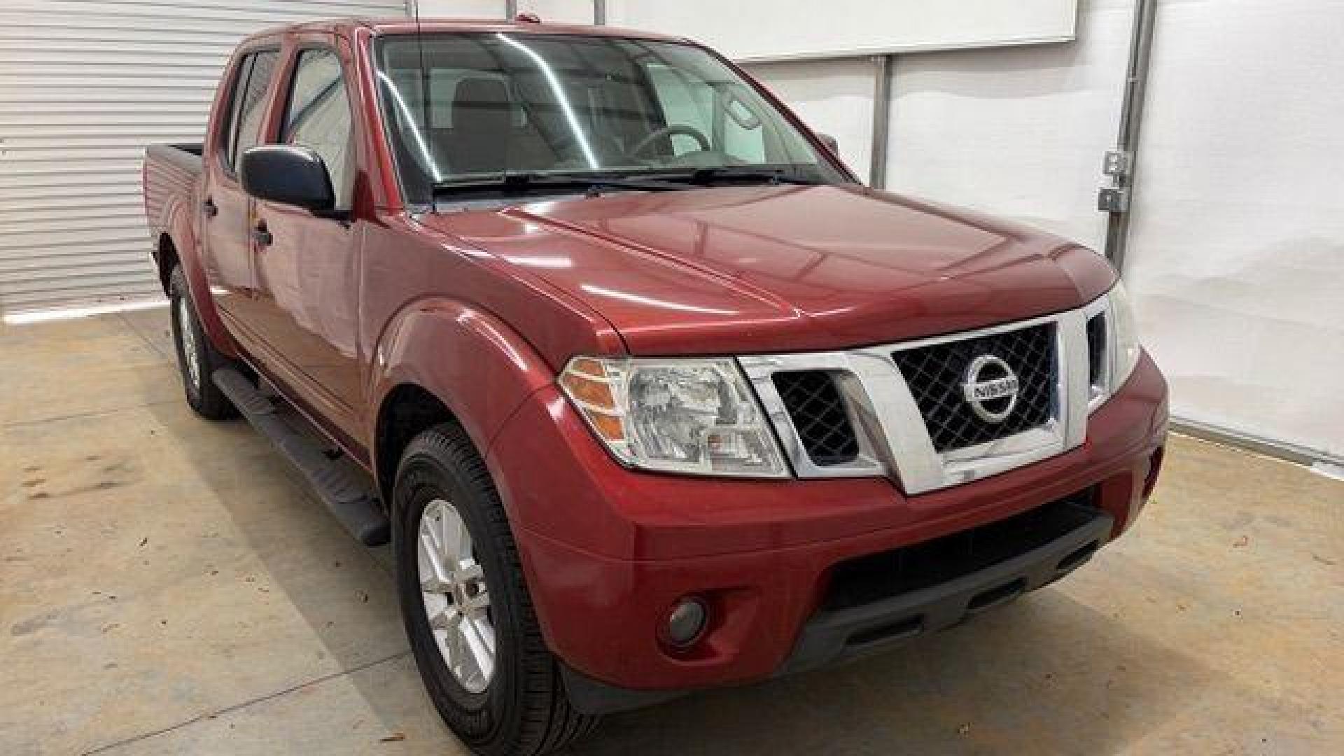 2016 Red Nissan Frontier SV (1N6AD0ER9GN) with an VQ 4L V-6 DOHC engine, located at 1806 Veterans Memorial Hwy SW, Austell, GA, 30168, (770) 944-9558, 33.817959, -84.606987 - Photo#10