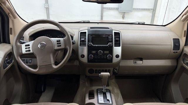 2016 Red Nissan Frontier SV (1N6AD0ER9GN) with an VQ 4L V-6 DOHC engine, located at 1806 Veterans Memorial Hwy SW, Austell, GA, 30168, (770) 944-9558, 33.817959, -84.606987 - Photo#16