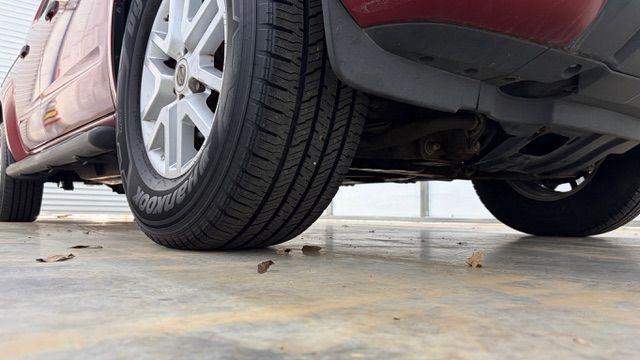 2016 Red Nissan Frontier SV (1N6AD0ER9GN) with an VQ 4L V-6 DOHC engine, located at 1806 Veterans Memorial Hwy SW, Austell, GA, 30168, (770) 944-9558, 33.817959, -84.606987 - Photo#19