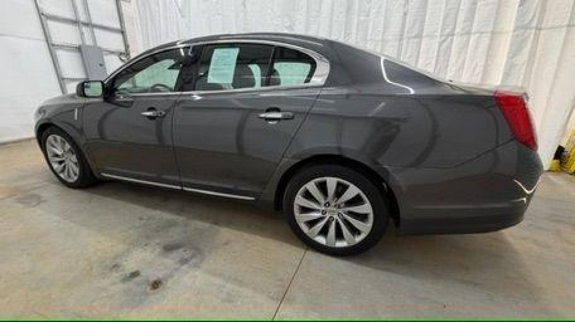 2016 Gray Lincoln MKS 4DR (1LNHL9DK9GG) , located at 1806 Veterans Memorial Hwy SW, Austell, GA, 30168, (770) 944-9558, 33.817959, -84.606987 - Photo#2