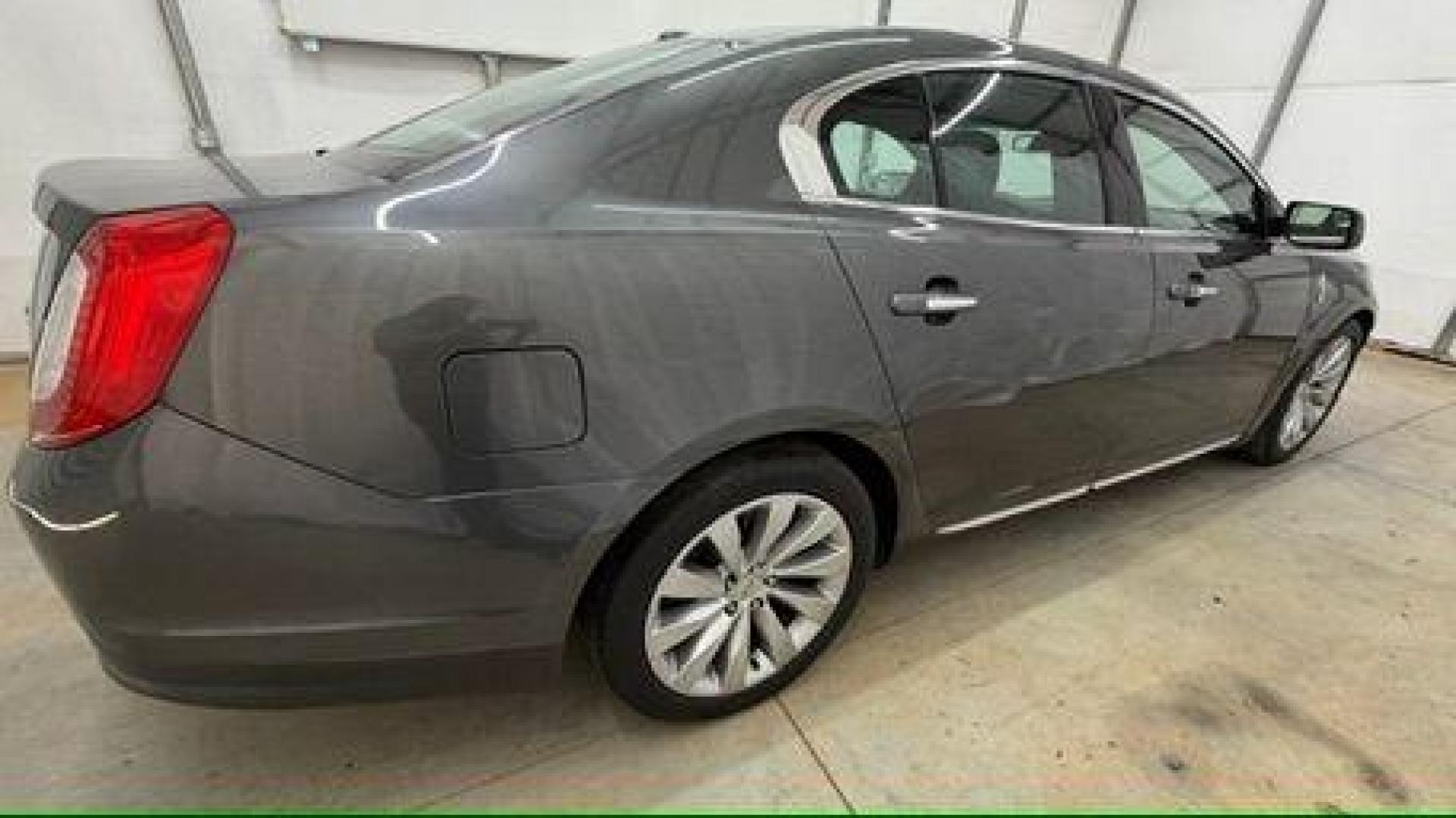2016 Gray Lincoln MKS 4DR (1LNHL9DK9GG) , located at 1806 Veterans Memorial Hwy SW, Austell, GA, 30168, (770) 944-9558, 33.817959, -84.606987 - Photo#6