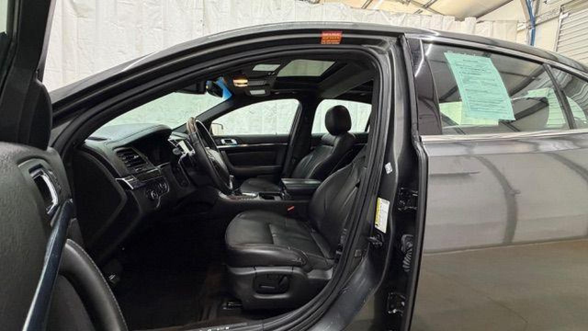 2016 Gray Lincoln MKS 4DR (1LNHL9DK9GG) , located at 1806 Veterans Memorial Hwy SW, Austell, GA, 30168, (770) 944-9558, 33.817959, -84.606987 - Photo#12