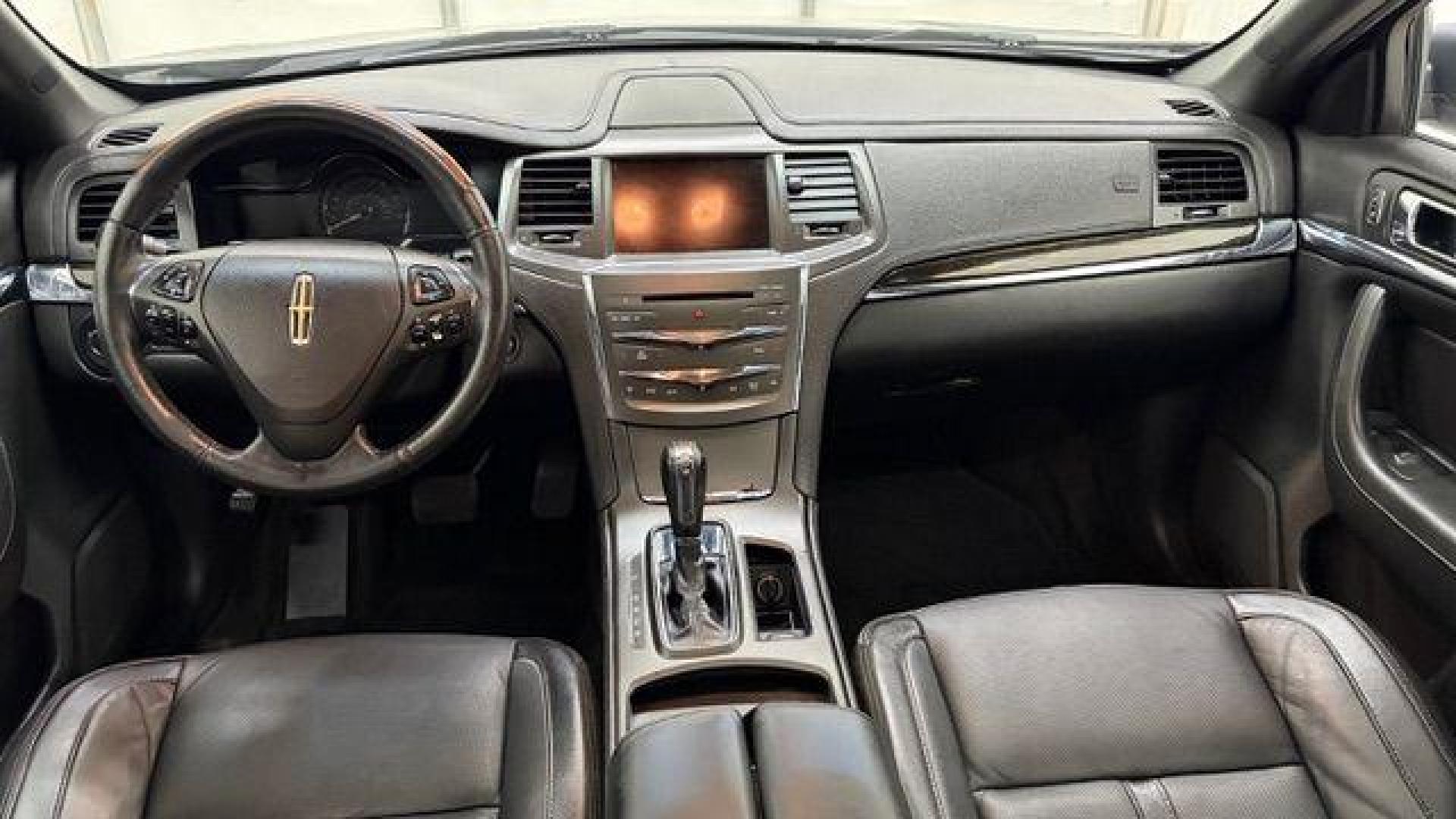 2016 Gray Lincoln MKS 4DR (1LNHL9DK9GG) , located at 1806 Veterans Memorial Hwy SW, Austell, GA, 30168, (770) 944-9558, 33.817959, -84.606987 - Photo#15