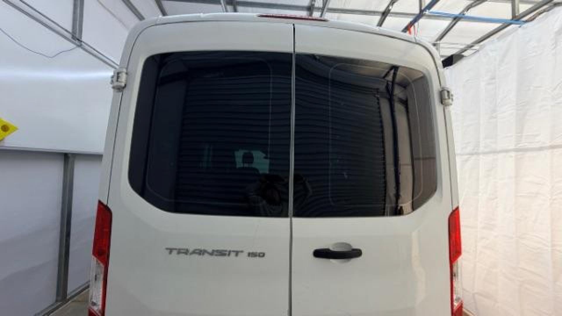 2016 White Ford Transit-150 Van Cargo (1FTYE1CM8GK) , located at 1806 Veterans Memorial Hwy SW, Austell, GA, 30168, (770) 944-9558, 33.817959, -84.606987 - Photo#2