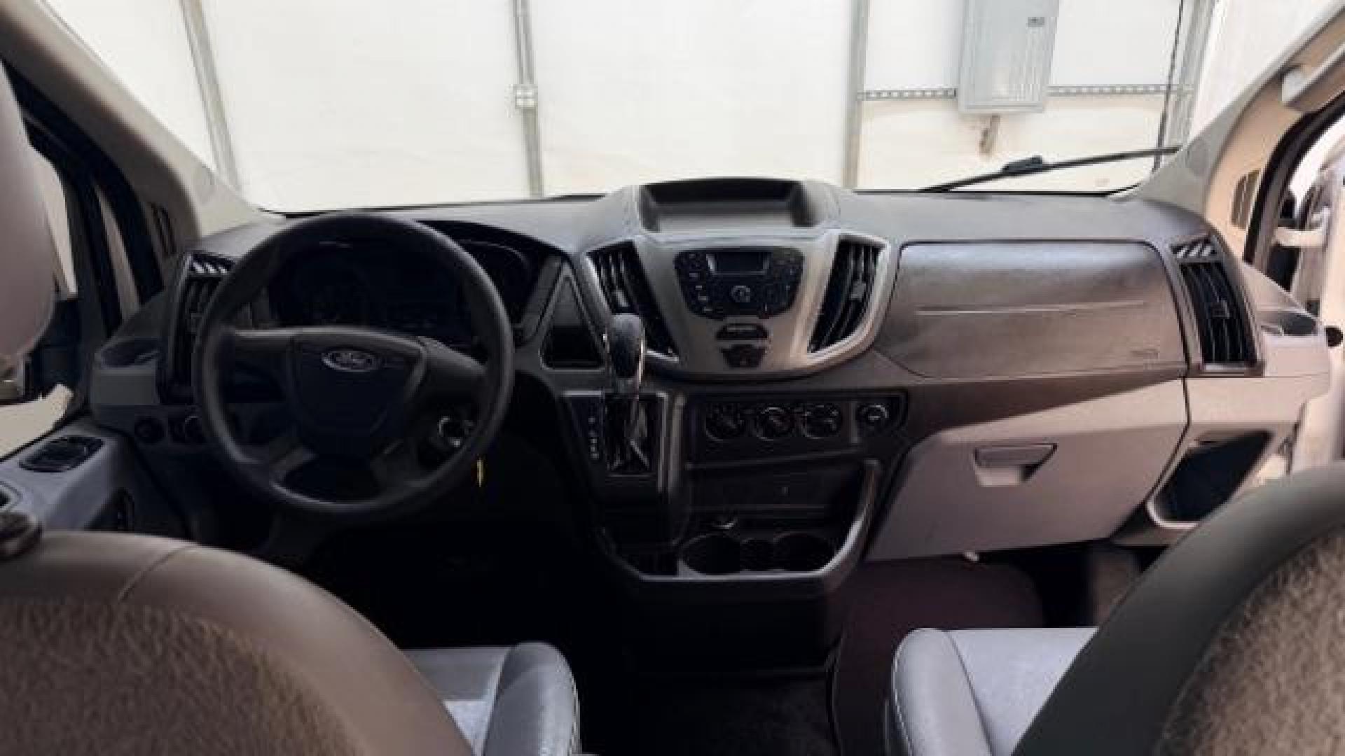 2016 White Ford Transit-150 Van Cargo (1FTYE1CM8GK) , located at 1806 Veterans Memorial Hwy SW, Austell, GA, 30168, (770) 944-9558, 33.817959, -84.606987 - Photo#21