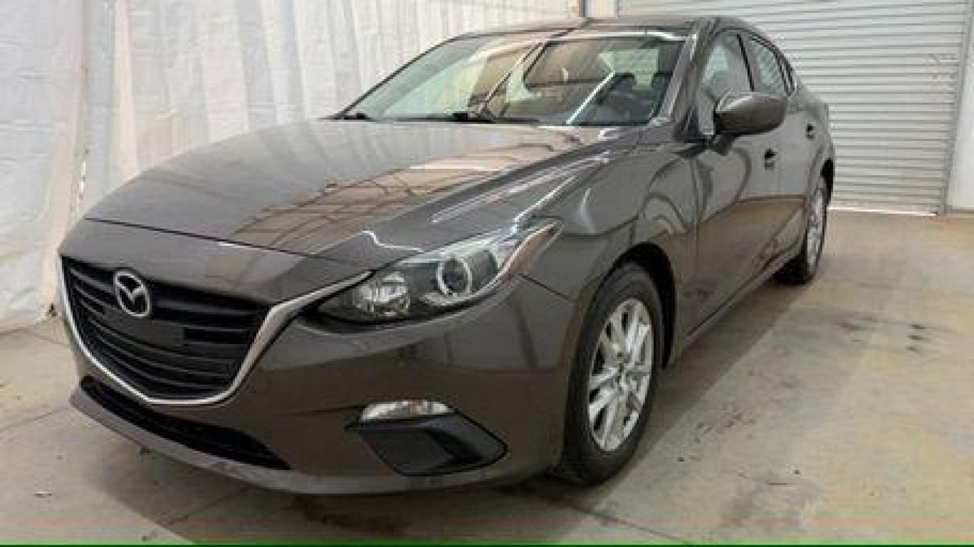 2014 Bronze Mazda Mazda3 i Touring (JM1BM1V74E1) with an SKYACTIV-G 2L I-4 gasoline direct injection engine, located at 1806 Veterans Memorial Hwy SW, Austell, GA, 30168, (770) 944-9558, 33.817959, -84.606987 - Photo#0