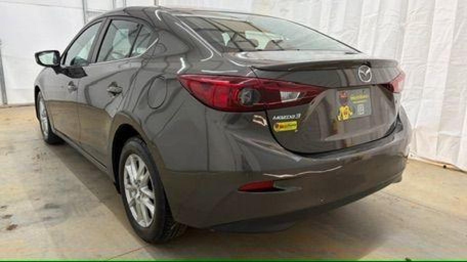 2014 Bronze Mazda Mazda3 i Touring (JM1BM1V74E1) with an SKYACTIV-G 2L I-4 gasoline direct injection engine, located at 1806 Veterans Memorial Hwy SW, Austell, GA, 30168, (770) 944-9558, 33.817959, -84.606987 - Photo#3