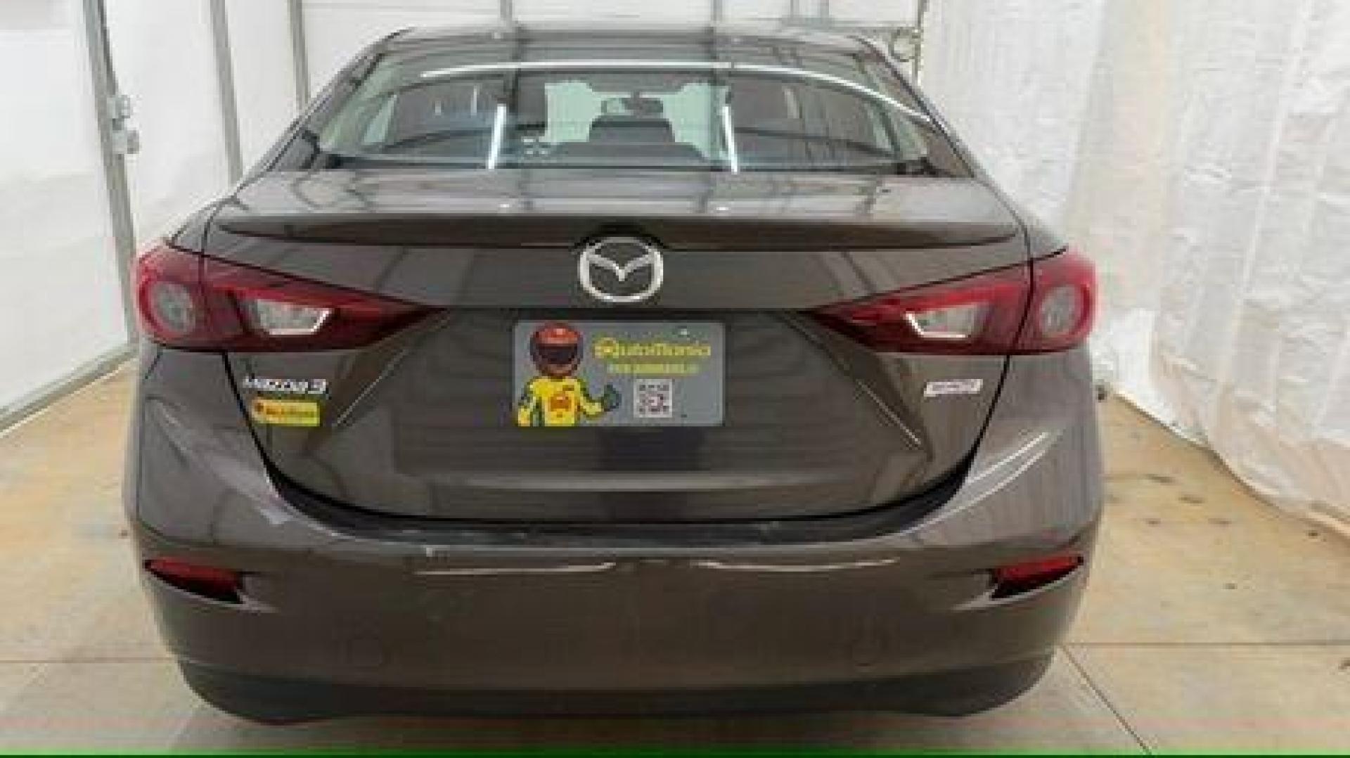 2014 Bronze Mazda Mazda3 i Touring (JM1BM1V74E1) with an SKYACTIV-G 2L I-4 gasoline direct injection engine, located at 1806 Veterans Memorial Hwy SW, Austell, GA, 30168, (770) 944-9558, 33.817959, -84.606987 - Photo#4