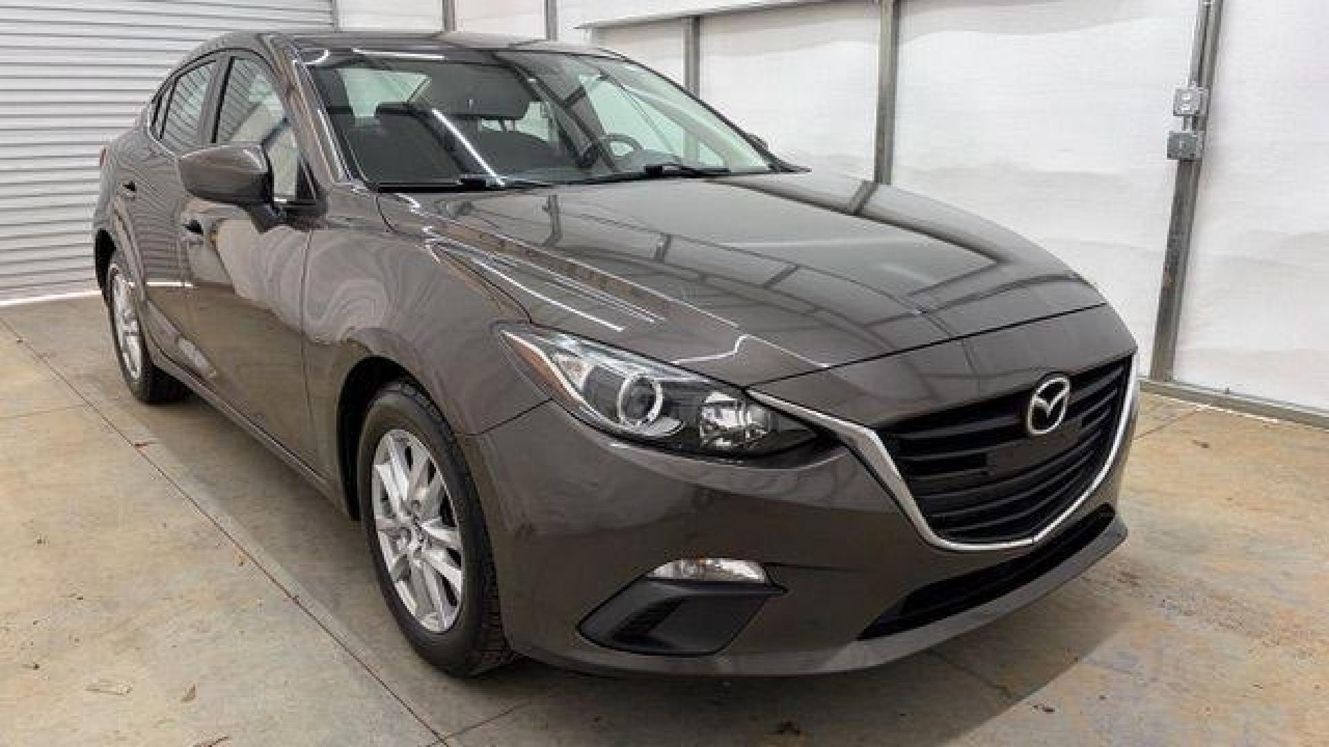 2014 Bronze Mazda Mazda3 i Touring (JM1BM1V74E1) with an SKYACTIV-G 2L I-4 gasoline direct injection engine, located at 1806 Veterans Memorial Hwy SW, Austell, GA, 30168, (770) 944-9558, 33.817959, -84.606987 - Photo#8