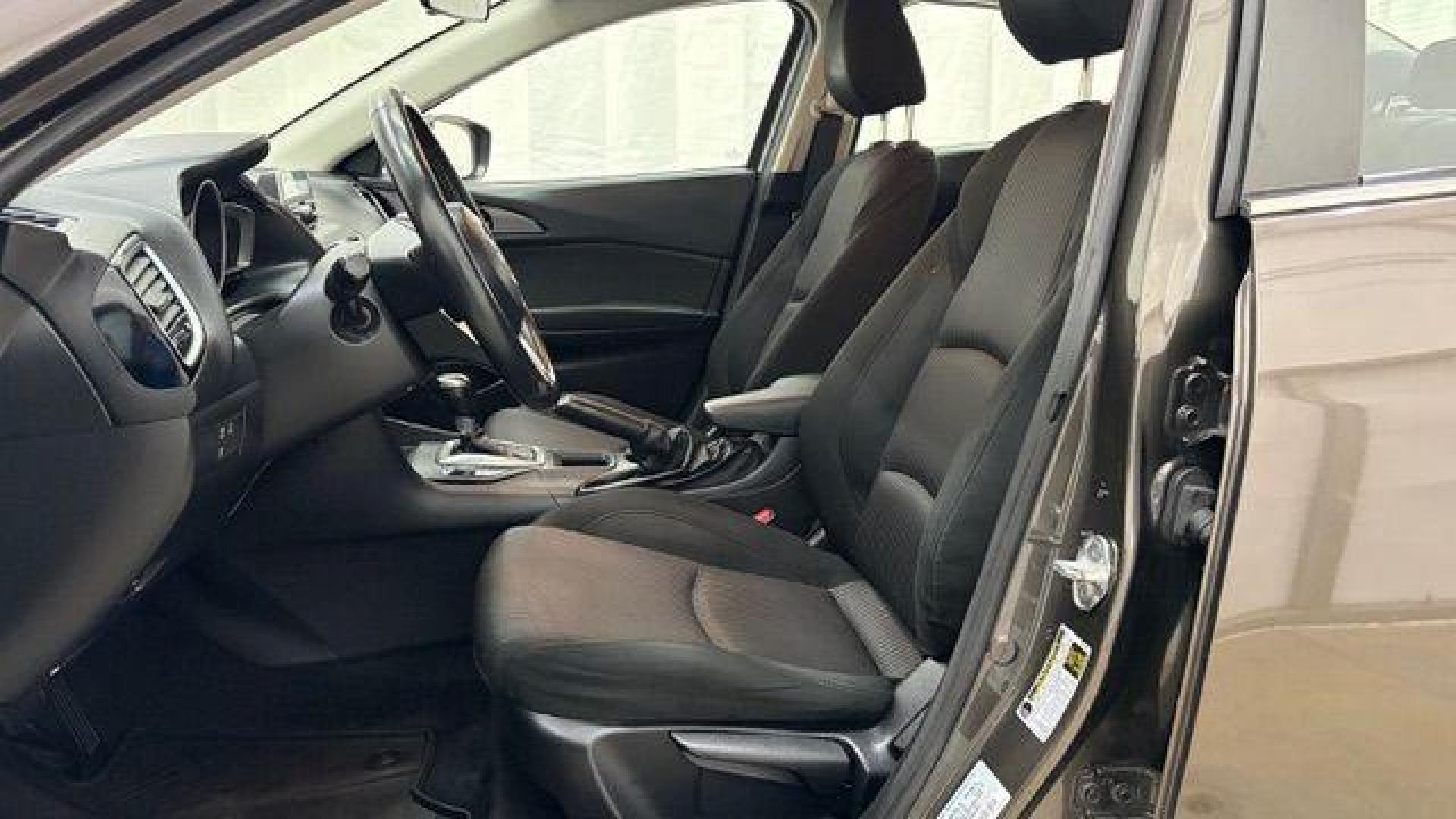 2014 Bronze Mazda Mazda3 i Touring (JM1BM1V74E1) with an SKYACTIV-G 2L I-4 gasoline direct injection engine, located at 1806 Veterans Memorial Hwy SW, Austell, GA, 30168, (770) 944-9558, 33.817959, -84.606987 - Photo#11