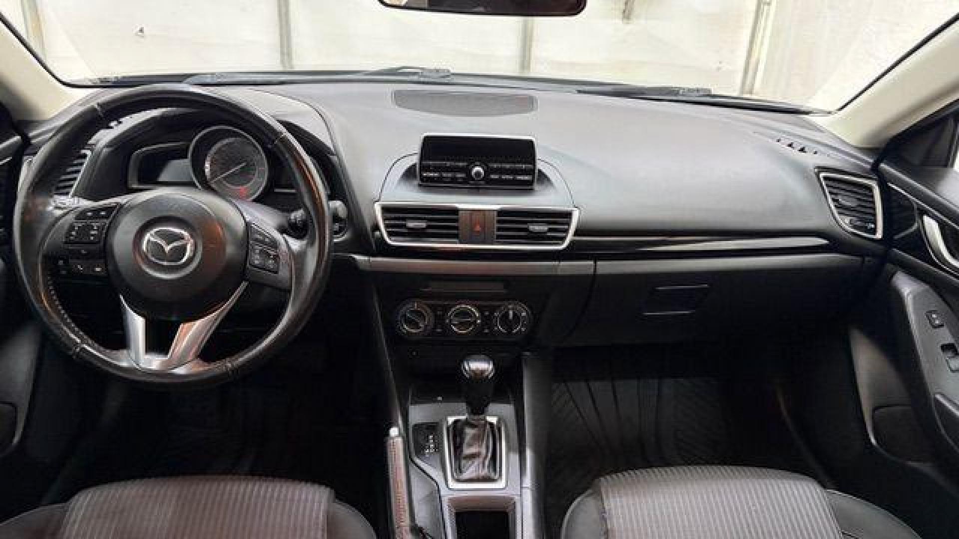 2014 Bronze Mazda Mazda3 i Touring (JM1BM1V74E1) with an SKYACTIV-G 2L I-4 gasoline direct injection engine, located at 1806 Veterans Memorial Hwy SW, Austell, GA, 30168, (770) 944-9558, 33.817959, -84.606987 - Photo#15