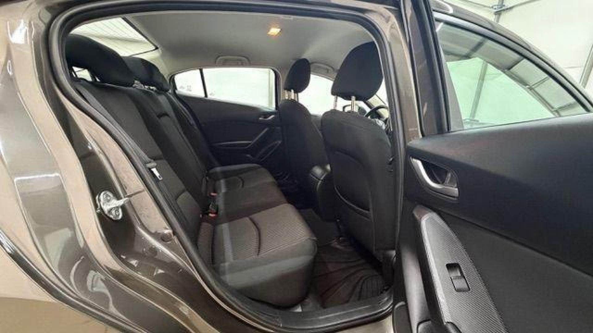 2014 Bronze Mazda Mazda3 i Touring (JM1BM1V74E1) with an SKYACTIV-G 2L I-4 gasoline direct injection engine, located at 1806 Veterans Memorial Hwy SW, Austell, GA, 30168, (770) 944-9558, 33.817959, -84.606987 - Photo#16