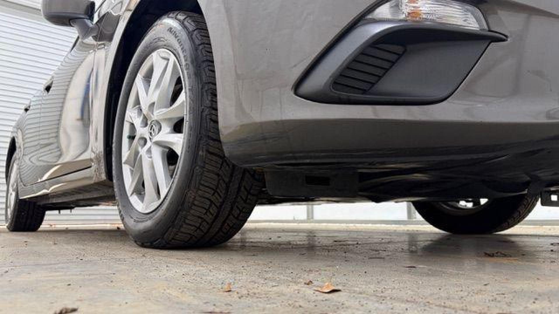 2014 Bronze Mazda Mazda3 i Touring (JM1BM1V74E1) with an SKYACTIV-G 2L I-4 gasoline direct injection engine, located at 1806 Veterans Memorial Hwy SW, Austell, GA, 30168, (770) 944-9558, 33.817959, -84.606987 - Photo#18