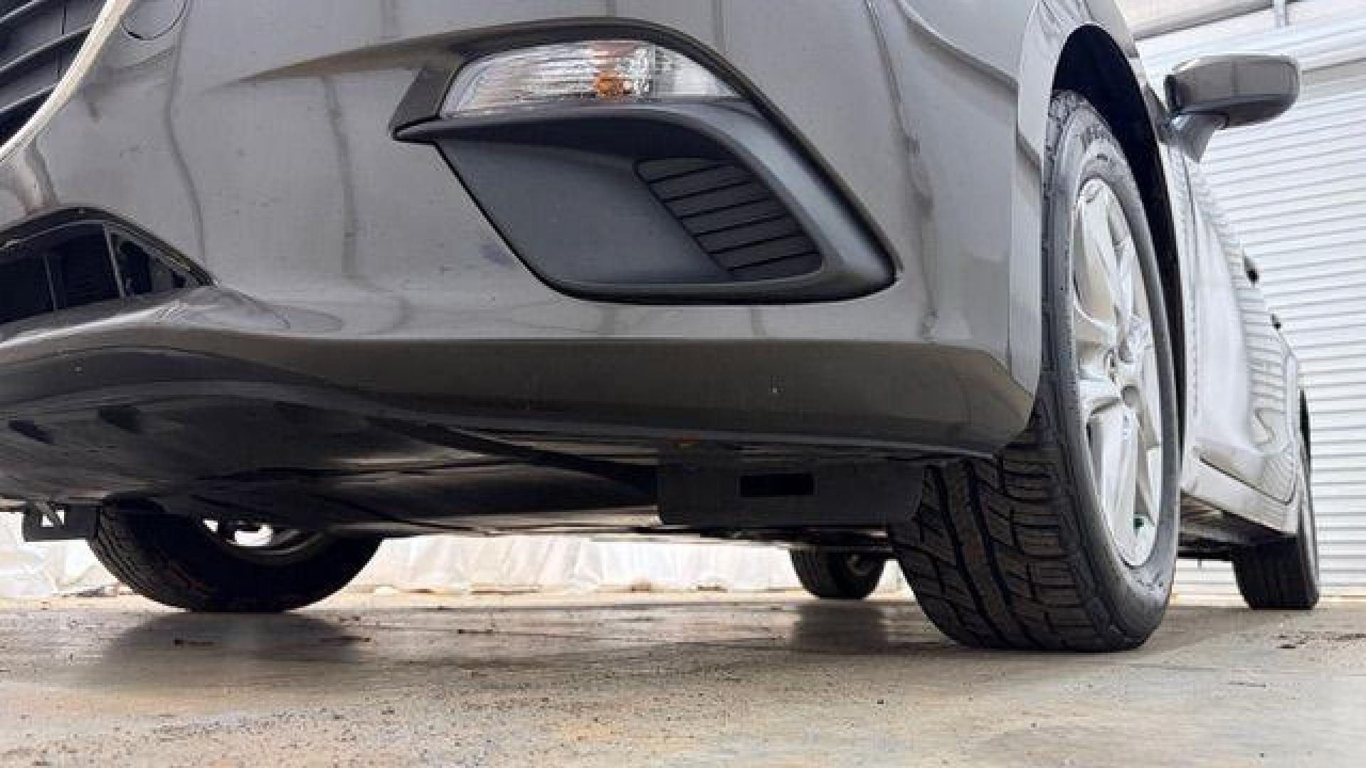 2014 Bronze Mazda Mazda3 i Touring (JM1BM1V74E1) with an SKYACTIV-G 2L I-4 gasoline direct injection engine, located at 1806 Veterans Memorial Hwy SW, Austell, GA, 30168, (770) 944-9558, 33.817959, -84.606987 - Photo#19