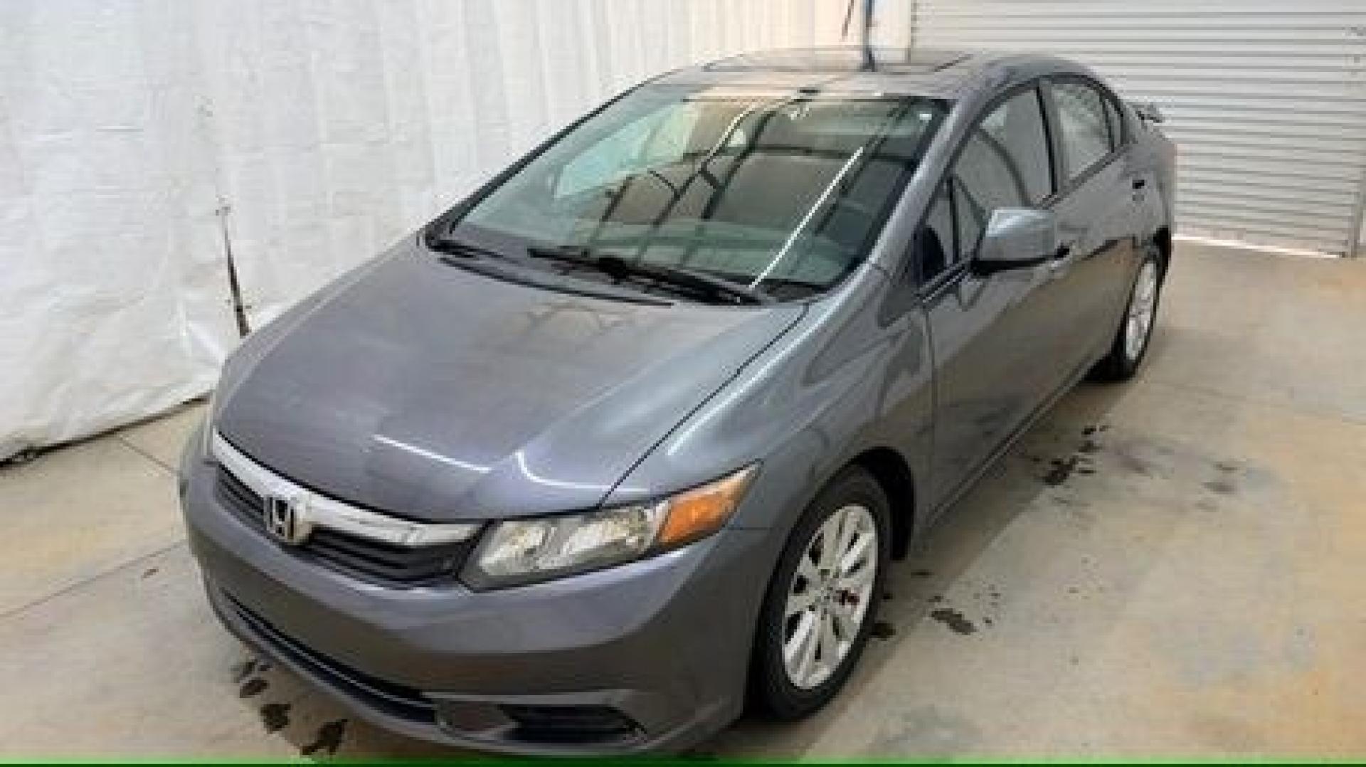2012 GRAY Honda Civic EX (19XFB2F8XCE) with an 1.8L I-4 i-VTEC variable valve control engine, located at 1806 Veterans Memorial Hwy SW, Austell, GA, 30168, (770) 944-9558, 33.817959, -84.606987 - Photo#0