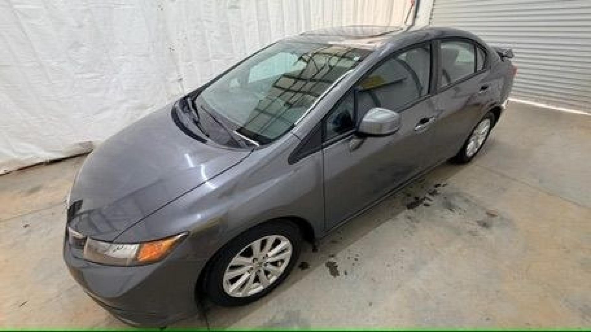 2012 GRAY Honda Civic EX (19XFB2F8XCE) with an 1.8L I-4 i-VTEC variable valve control engine, located at 1806 Veterans Memorial Hwy SW, Austell, GA, 30168, (770) 944-9558, 33.817959, -84.606987 - Photo#1