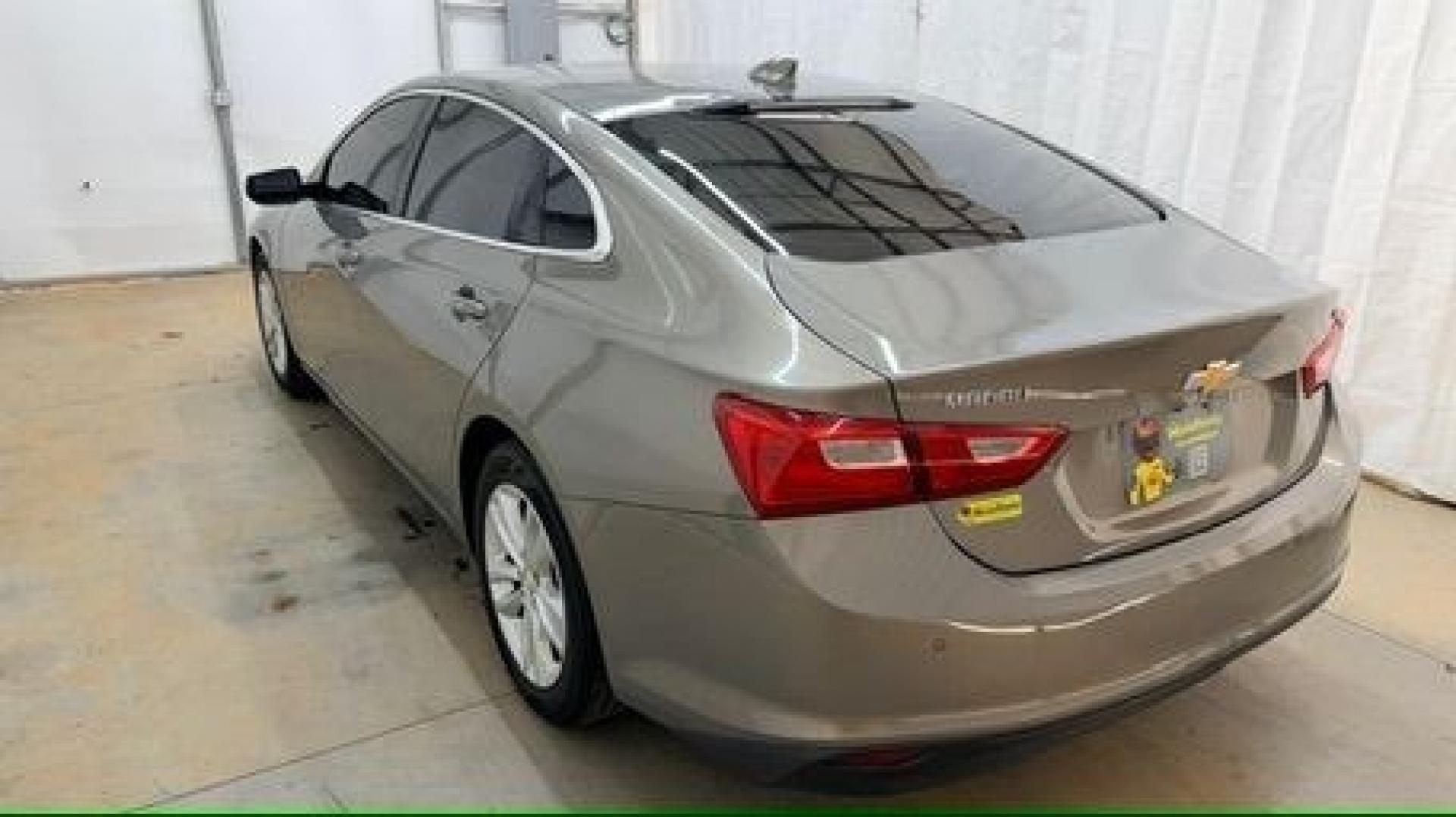 2017 Brown Chevrolet Malibu 1LT (1G1ZE5ST8HF) with an 1.5L I-4 gasoline direct injection engine, located at 1806 Veterans Memorial Hwy SW, Austell, GA, 30168, (770) 944-9558, 33.817959, -84.606987 - Photo#3