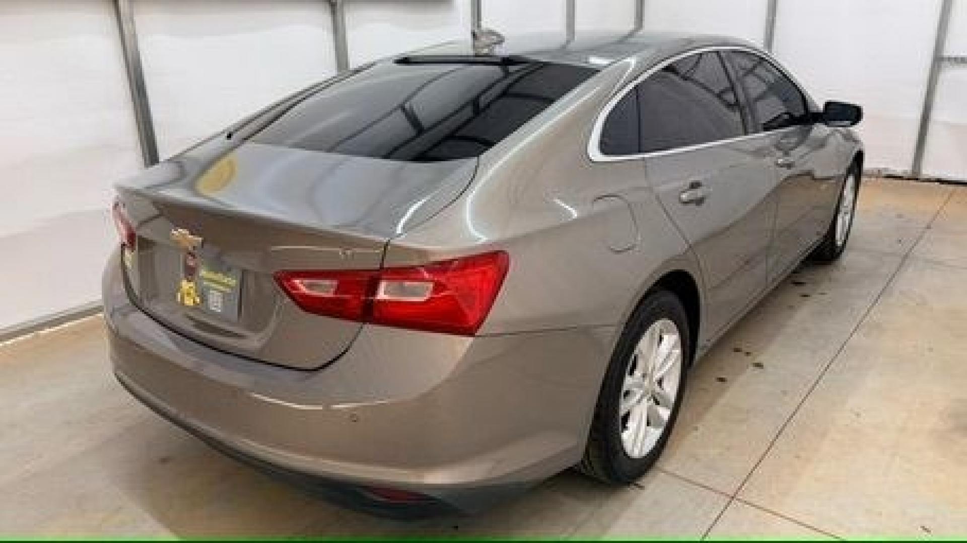 2017 Brown Chevrolet Malibu 1LT (1G1ZE5ST8HF) with an 1.5L I-4 gasoline direct injection engine, located at 1806 Veterans Memorial Hwy SW, Austell, GA, 30168, (770) 944-9558, 33.817959, -84.606987 - Photo#5