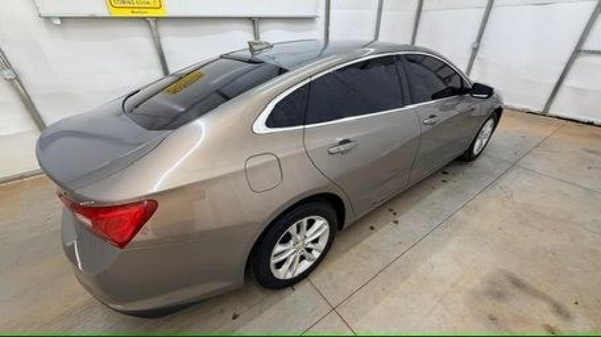 2017 Brown Chevrolet Malibu 1LT (1G1ZE5ST8HF) with an 1.5L I-4 gasoline direct injection engine, located at 1806 Veterans Memorial Hwy SW, Austell, GA, 30168, (770) 944-9558, 33.817959, -84.606987 - Photo#6