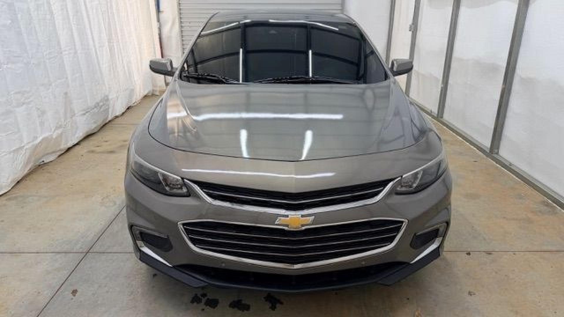 2017 Brown Chevrolet Malibu 1LT (1G1ZE5ST8HF) with an 1.5L I-4 gasoline direct injection engine, located at 1806 Veterans Memorial Hwy SW, Austell, GA, 30168, (770) 944-9558, 33.817959, -84.606987 - Photo#9