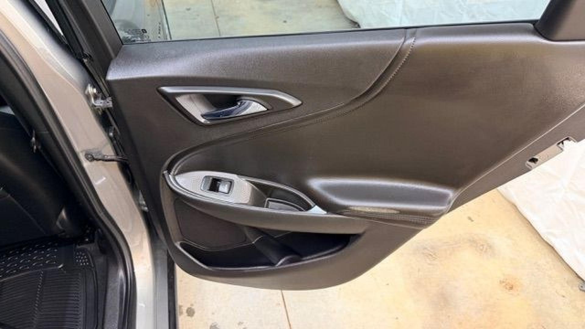 2017 Brown Chevrolet Malibu 1LT (1G1ZE5ST8HF) with an 1.5L I-4 gasoline direct injection engine, located at 1806 Veterans Memorial Hwy SW, Austell, GA, 30168, (770) 944-9558, 33.817959, -84.606987 - Photo#15