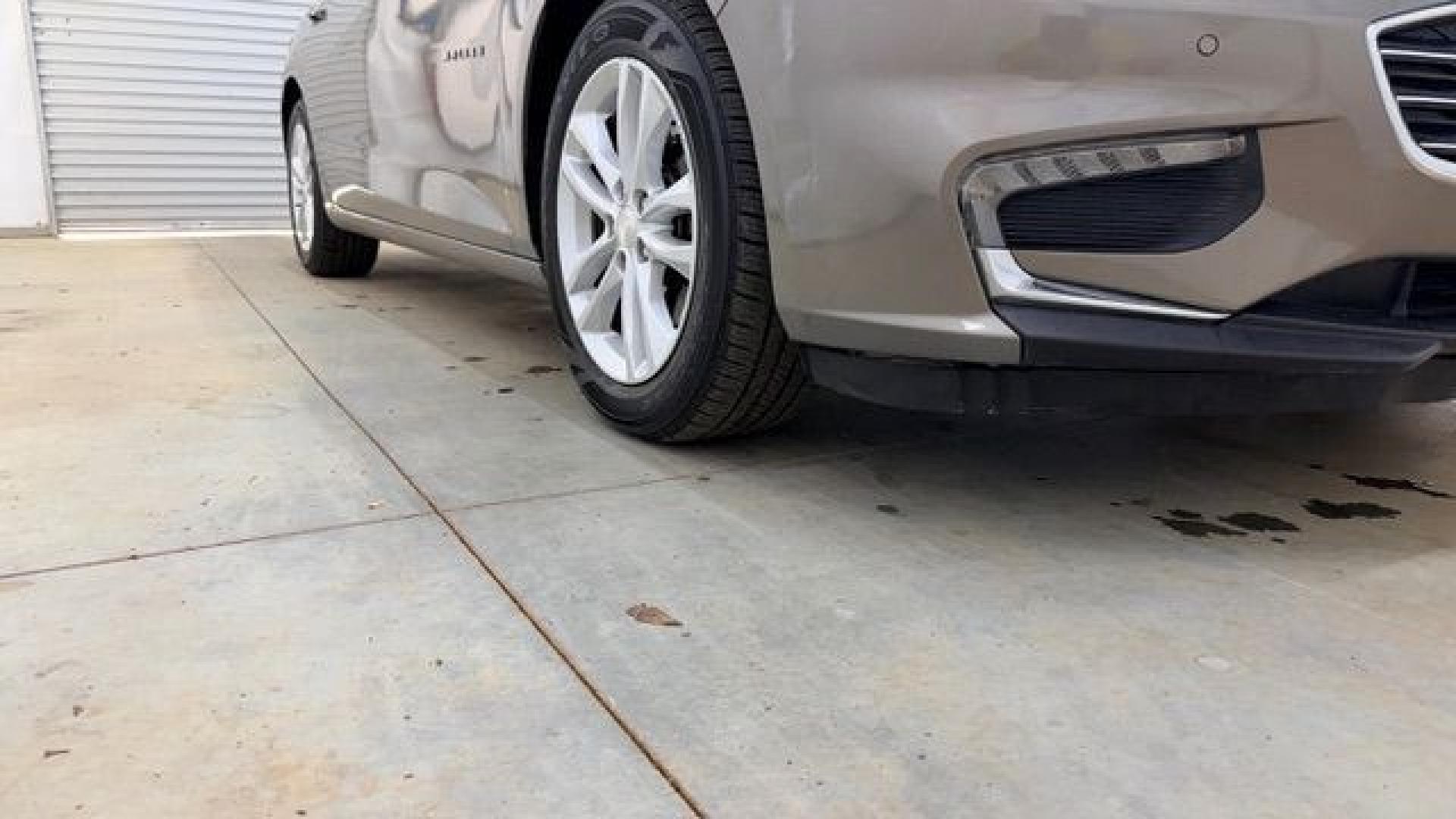 2017 Brown Chevrolet Malibu 1LT (1G1ZE5ST8HF) with an 1.5L I-4 gasoline direct injection engine, located at 1806 Veterans Memorial Hwy SW, Austell, GA, 30168, (770) 944-9558, 33.817959, -84.606987 - Photo#19