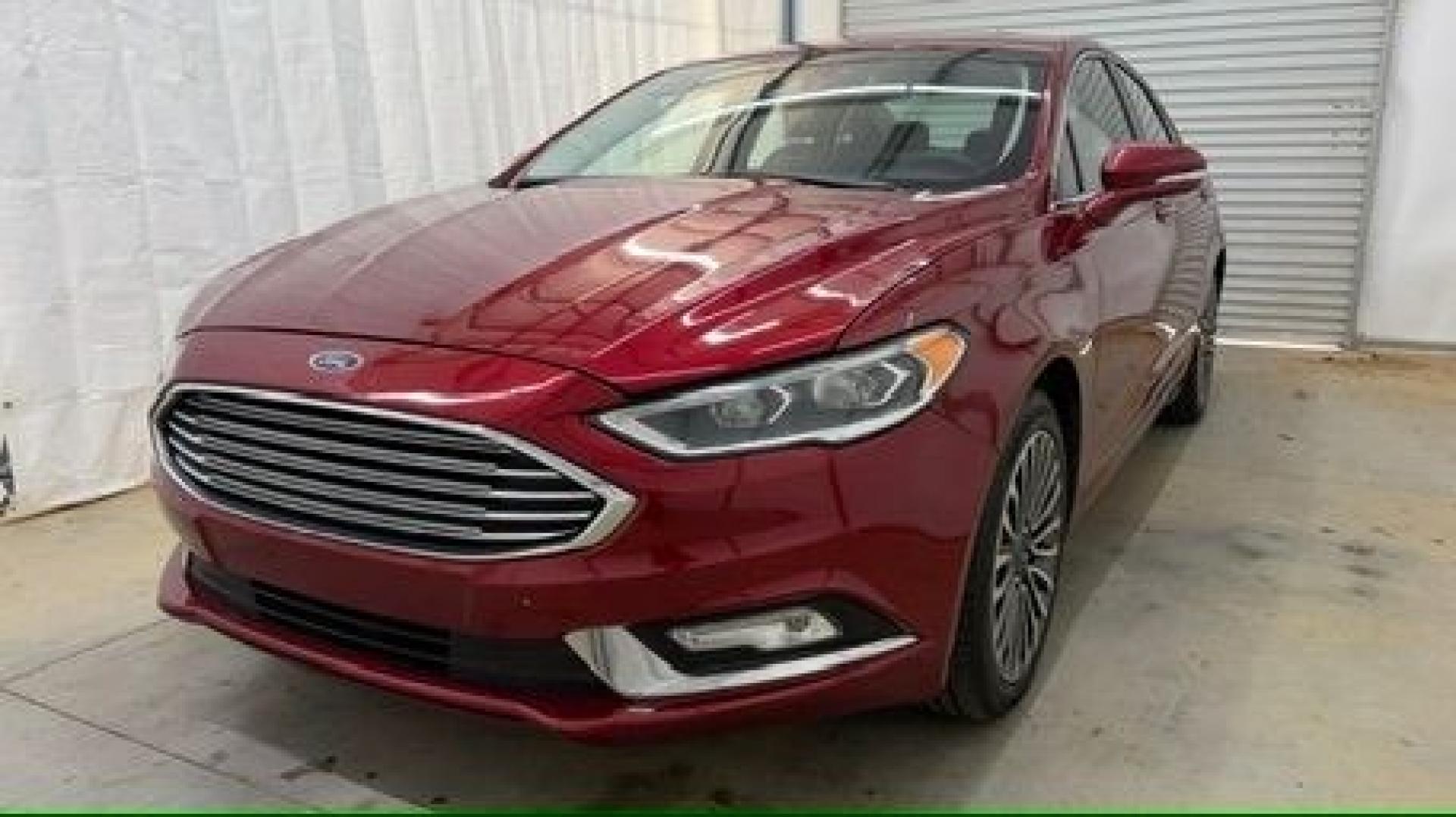 2017 Red Ford Fusion SE (3FA6P0T99HR) with an EcoBoost 2L I-4 gasoline direct injection engine, located at 1806 Veterans Memorial Hwy SW, Austell, GA, 30168, (770) 944-9558, 33.817959, -84.606987 - Photo#0