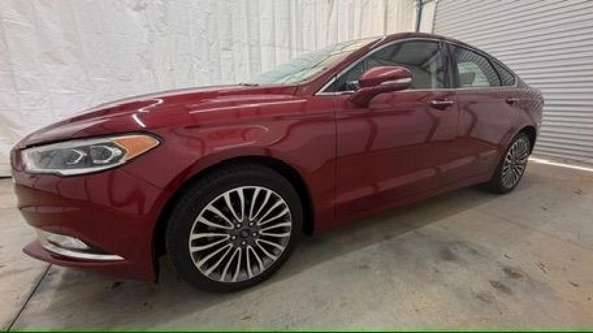 2017 Red Ford Fusion SE (3FA6P0T99HR) with an EcoBoost 2L I-4 gasoline direct injection engine, located at 1806 Veterans Memorial Hwy SW, Austell, GA, 30168, (770) 944-9558, 33.817959, -84.606987 - Photo#1