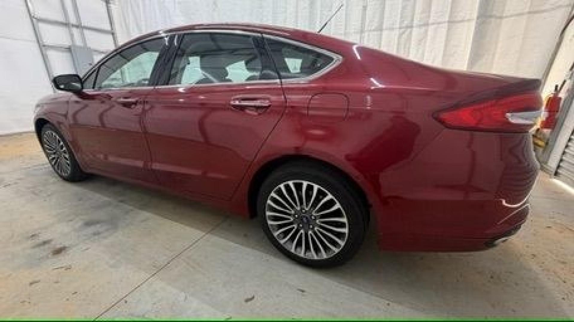 2017 Red Ford Fusion SE (3FA6P0T99HR) with an EcoBoost 2L I-4 gasoline direct injection engine, located at 1806 Veterans Memorial Hwy SW, Austell, GA, 30168, (770) 944-9558, 33.817959, -84.606987 - Photo#2
