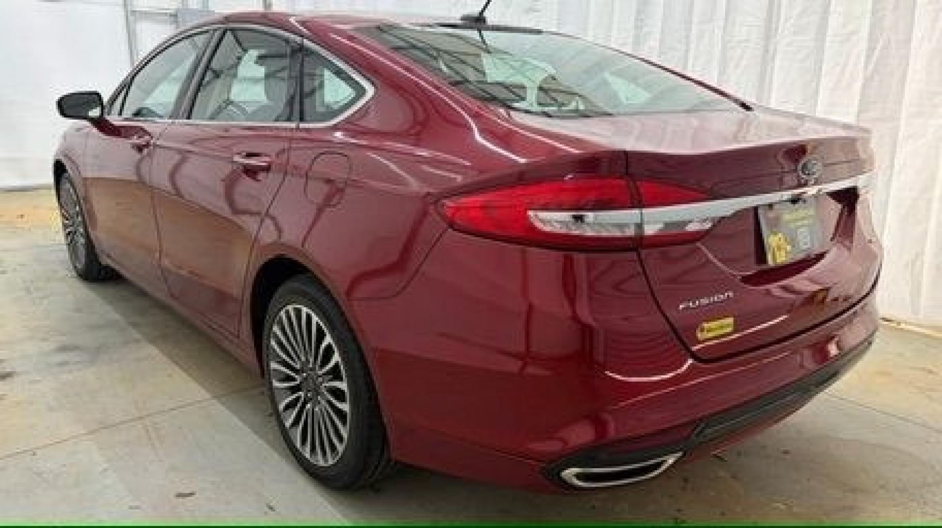 2017 Red Ford Fusion SE (3FA6P0T99HR) with an EcoBoost 2L I-4 gasoline direct injection engine, located at 1806 Veterans Memorial Hwy SW, Austell, GA, 30168, (770) 944-9558, 33.817959, -84.606987 - Photo#3
