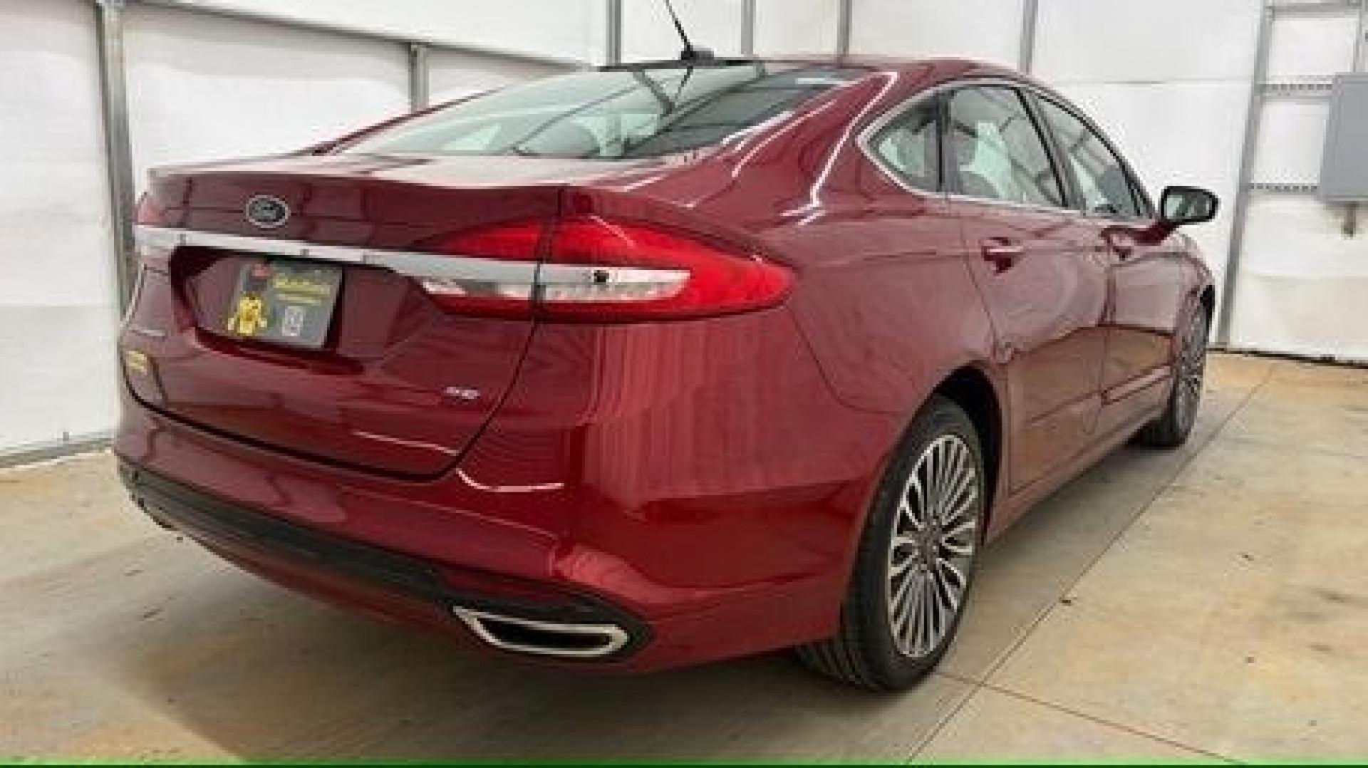 2017 Red Ford Fusion SE (3FA6P0T99HR) with an EcoBoost 2L I-4 gasoline direct injection engine, located at 1806 Veterans Memorial Hwy SW, Austell, GA, 30168, (770) 944-9558, 33.817959, -84.606987 - Photo#5