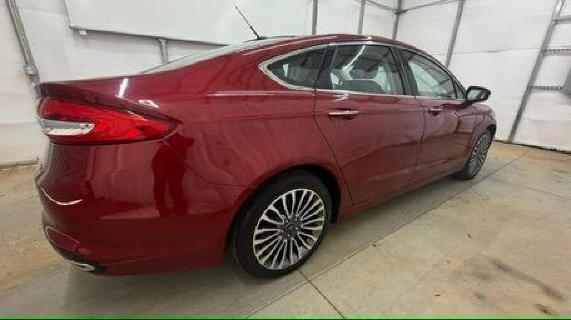 2017 Red Ford Fusion SE (3FA6P0T99HR) with an EcoBoost 2L I-4 gasoline direct injection engine, located at 1806 Veterans Memorial Hwy SW, Austell, GA, 30168, (770) 944-9558, 33.817959, -84.606987 - Photo#6